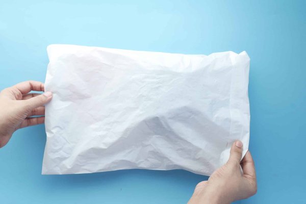 Quel est le nombre de timbres à mettre sur une enveloppe postale ?